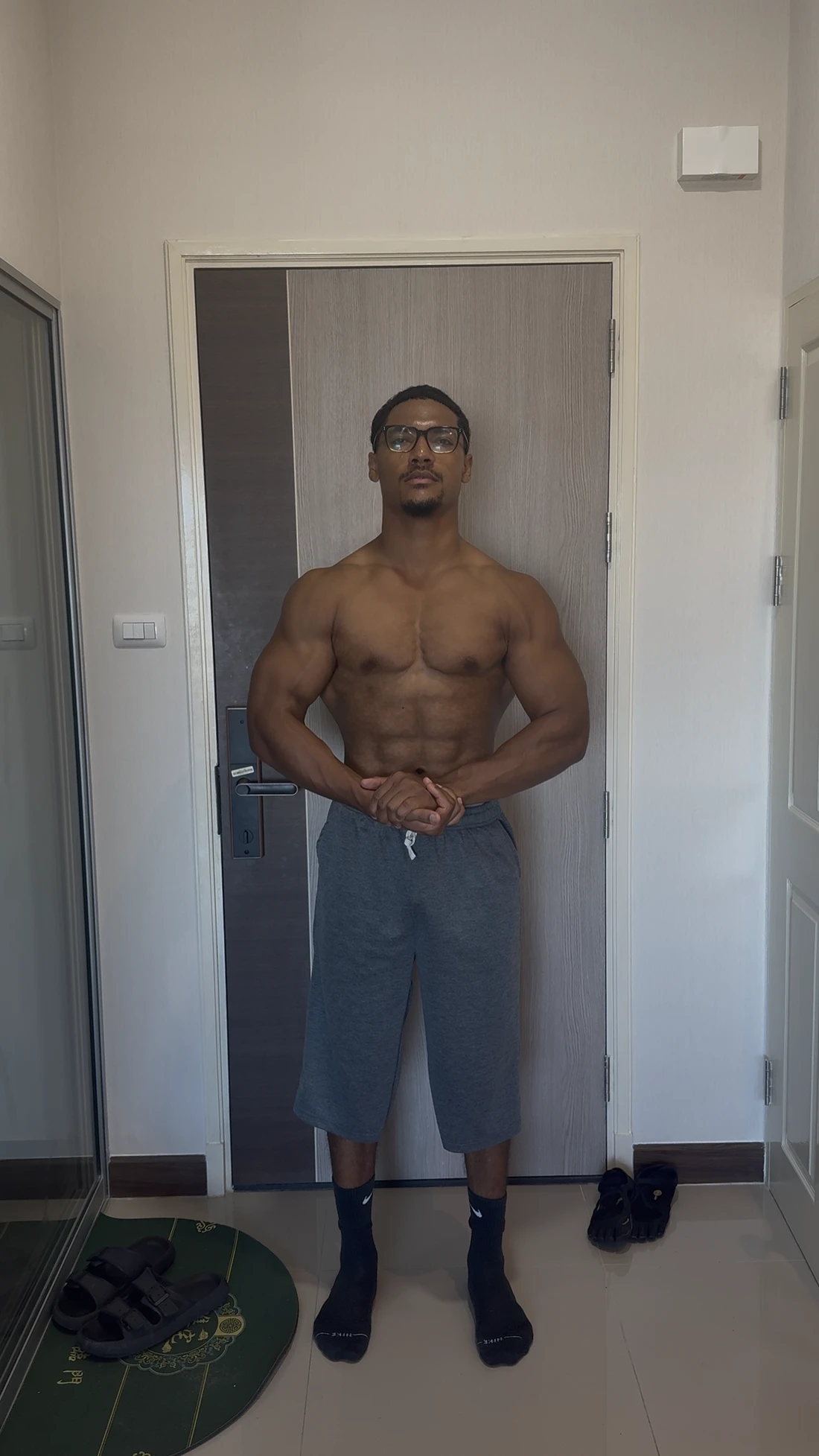 Elijah showing his current physique after years of training